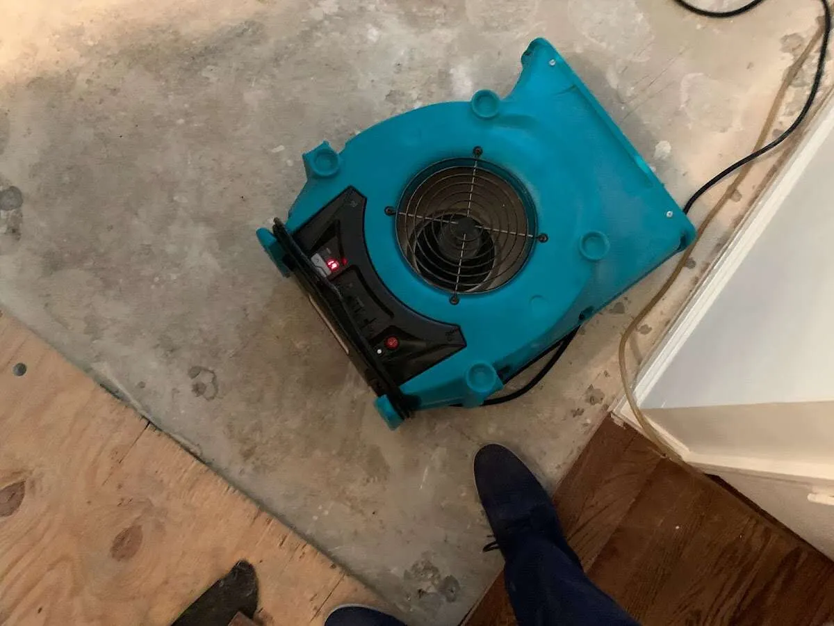 Air mover drying subfloor during Leak Detection & Repair in San Angelo